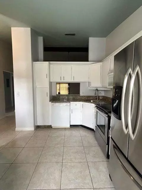 Greenacres, FL 33415,725 Sunny Pine WAY A