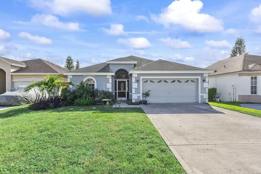 107 Meadowlands DR, Royal Palm Beach, FL 33411