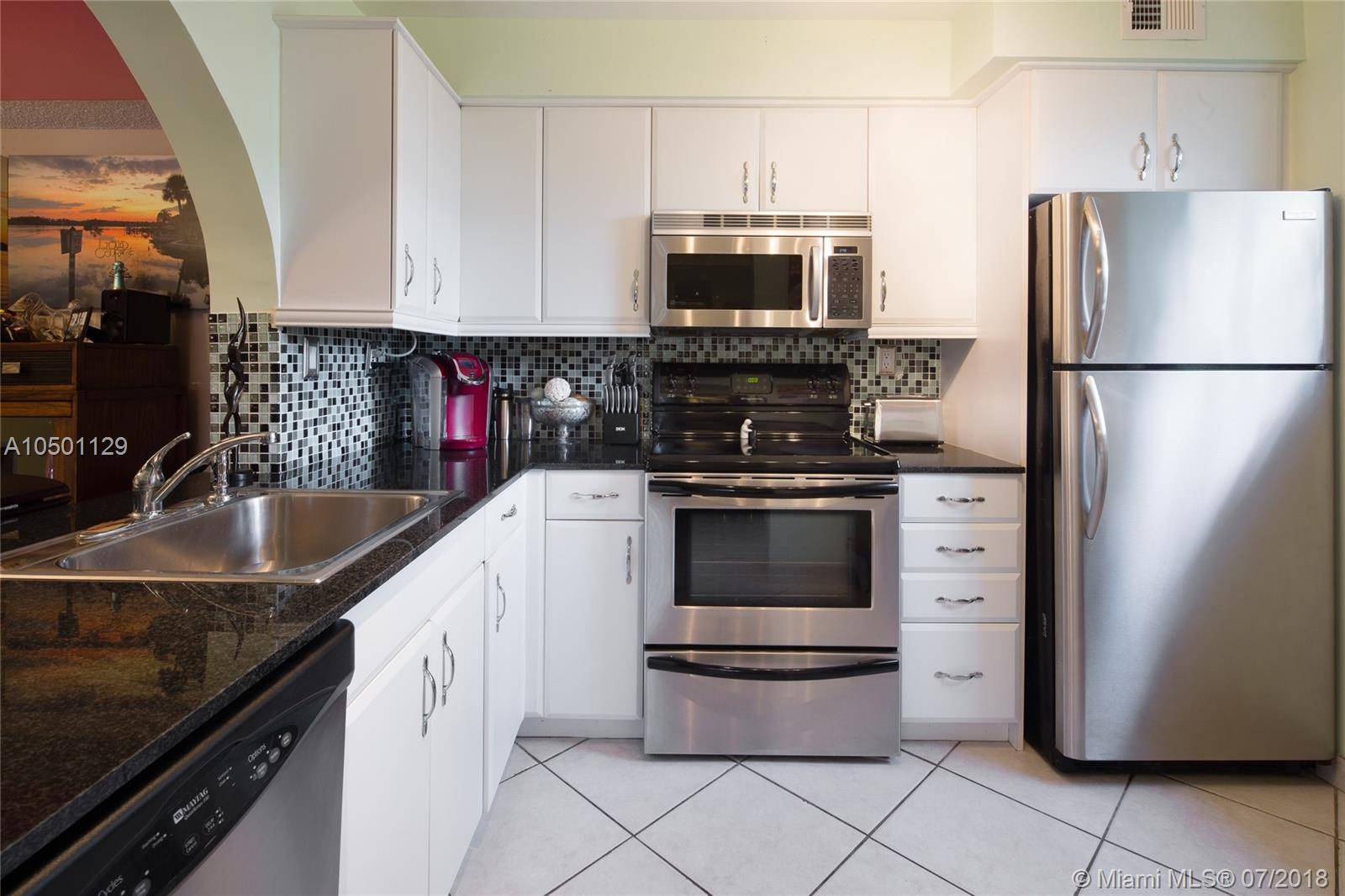 2713 S Oakland Forest Dr #202, Oakland Park, FL 33309