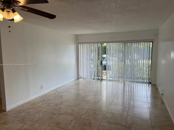 8741 Wiles Rd #103, Coral Springs, FL 33067