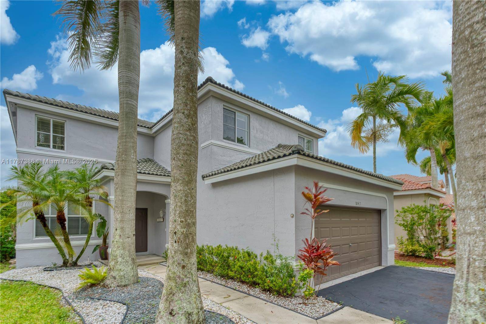Weston, FL 33327,1042 Bluewood Ter