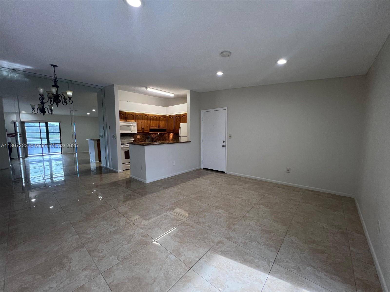 Tamarac, FL 33321,9873 N Belfort Cir #215