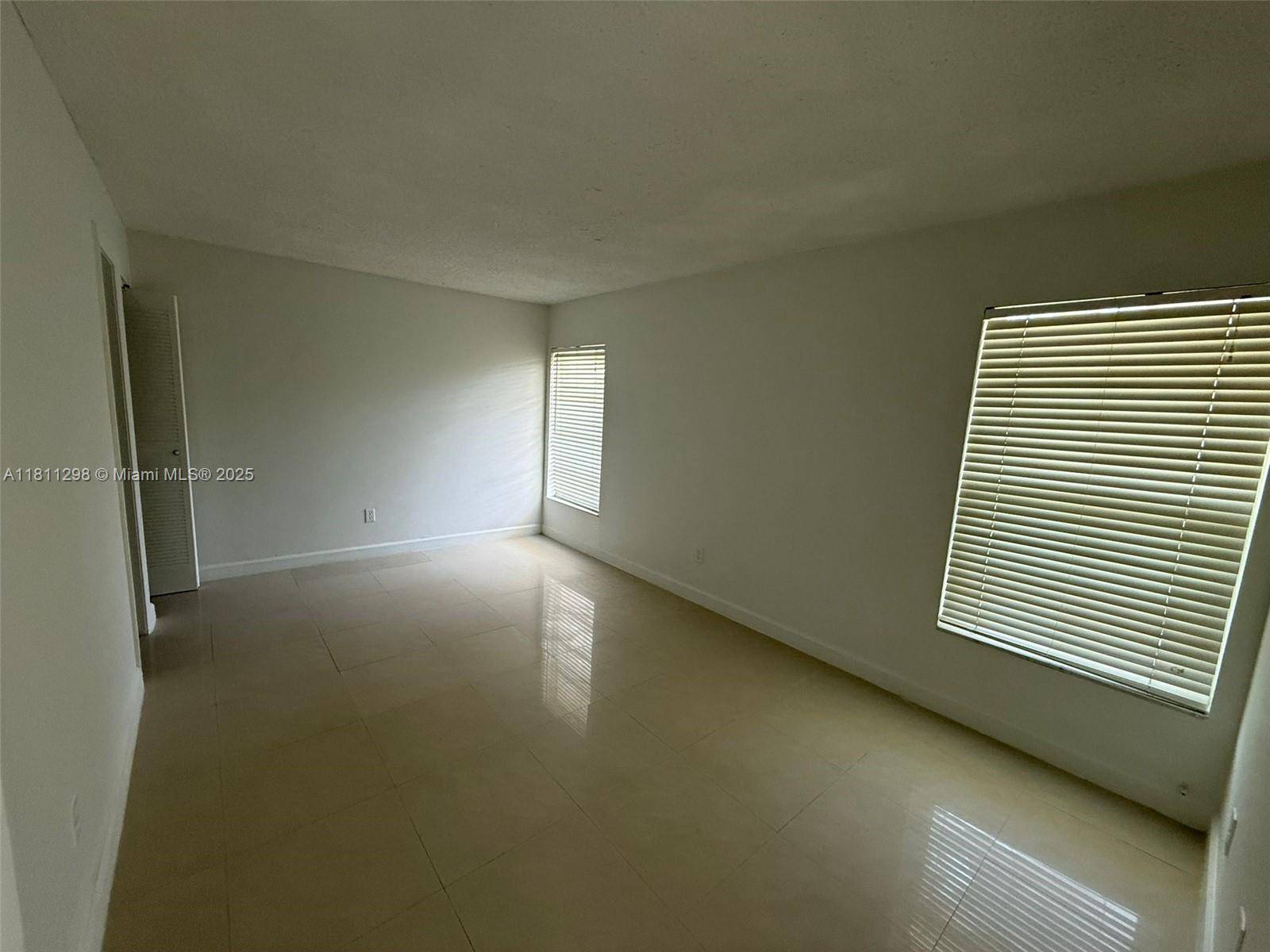 North Miami Beach, FL 33160,3868 NE 169th St #204
