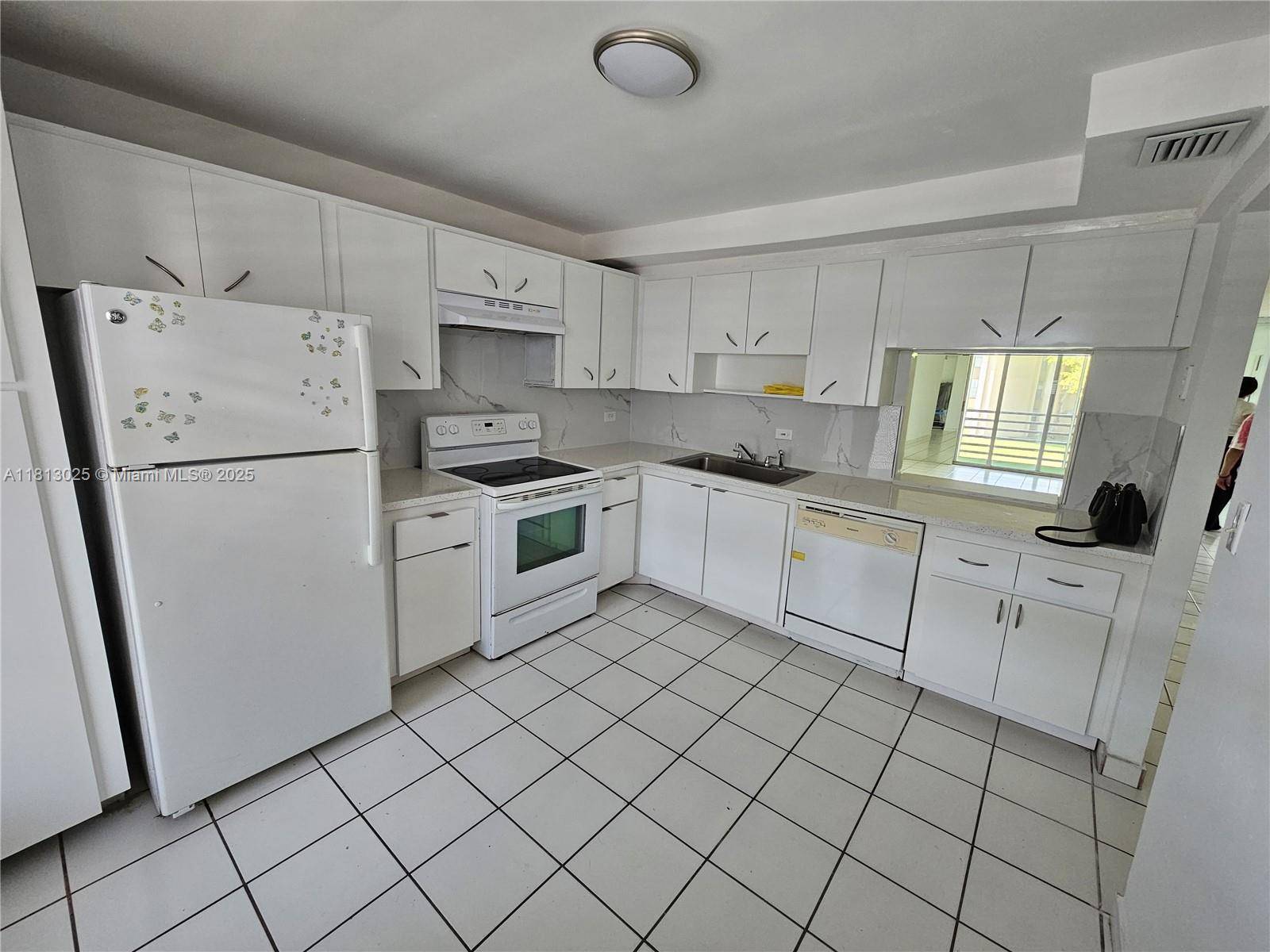 Miami, FL 33179,447 NE 195th St #220