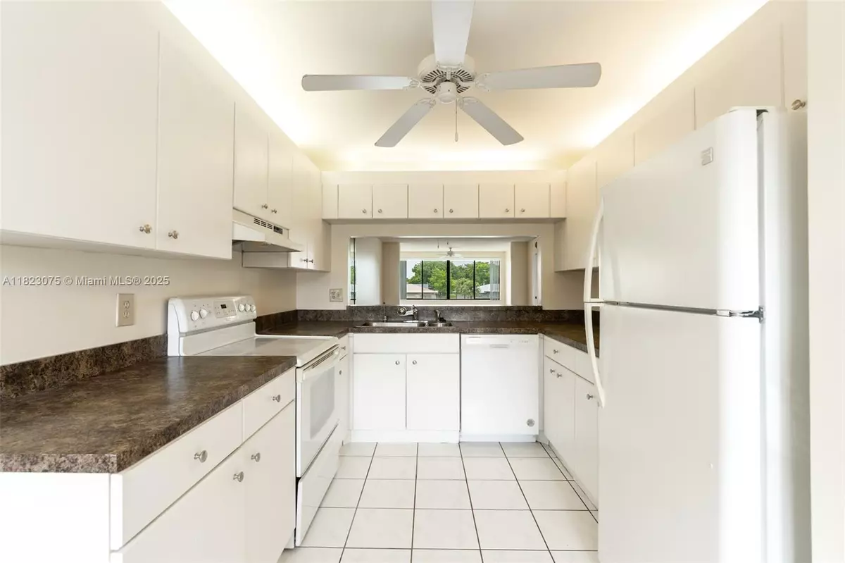 Tamarac, FL 33321,9455 N Belfort Cir #211