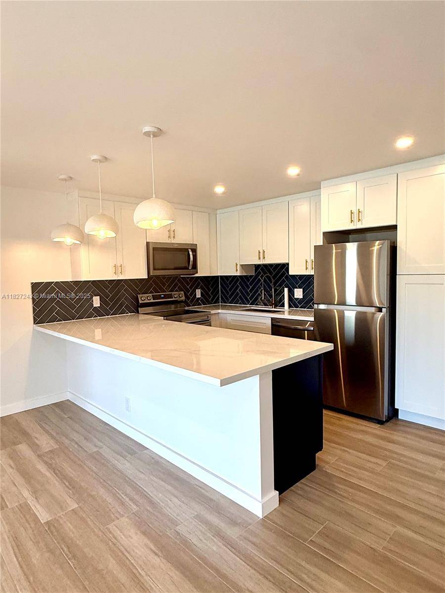 1116 Green Pine Blvd #D1, West Palm Beach, FL 33409