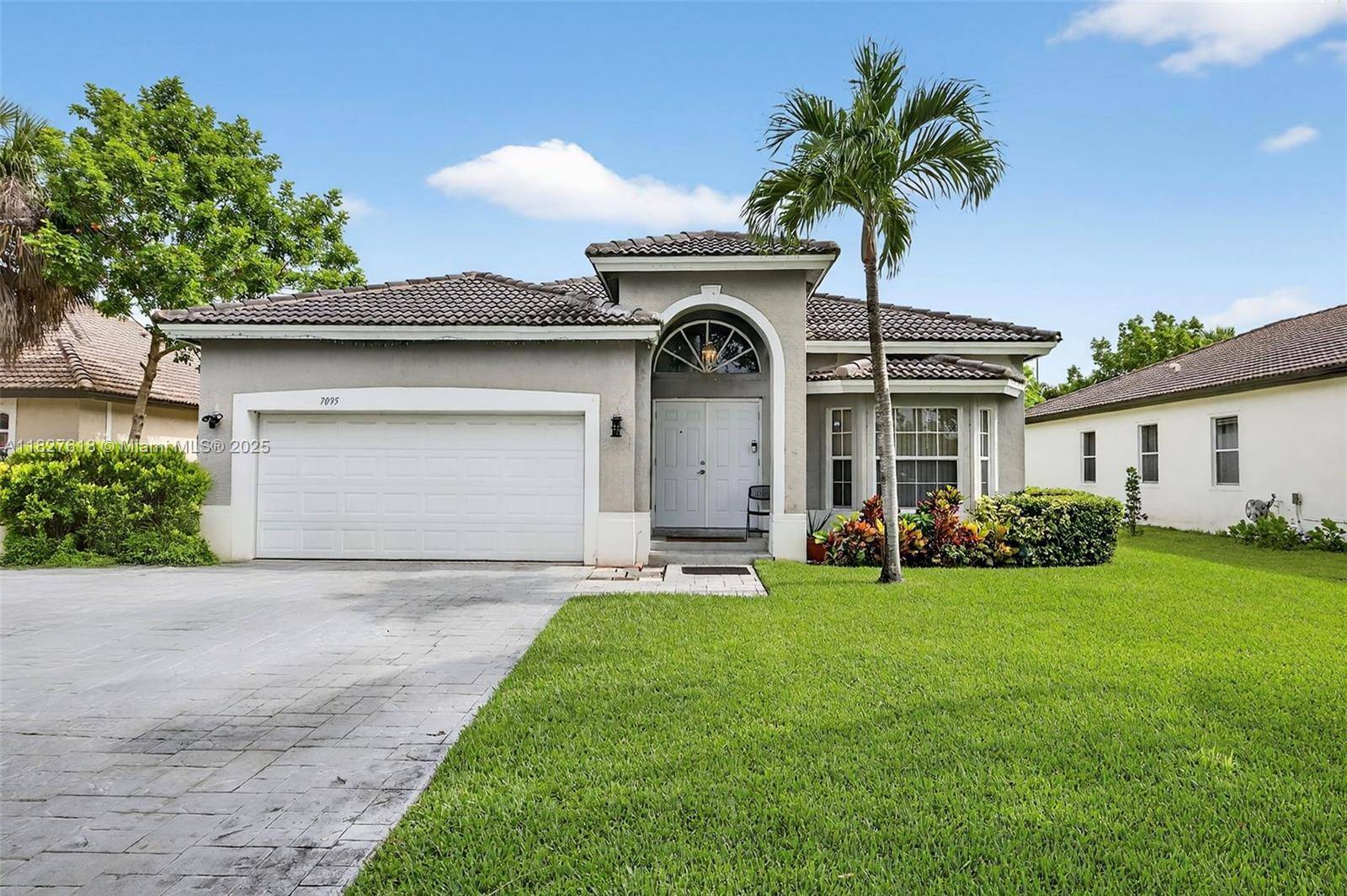 7095 E Tropical Way, Plantation, FL 33317