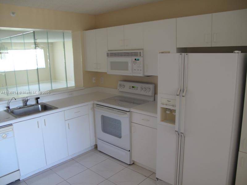 Tamarac, FL 33321,9511 Weldon Cir #G215