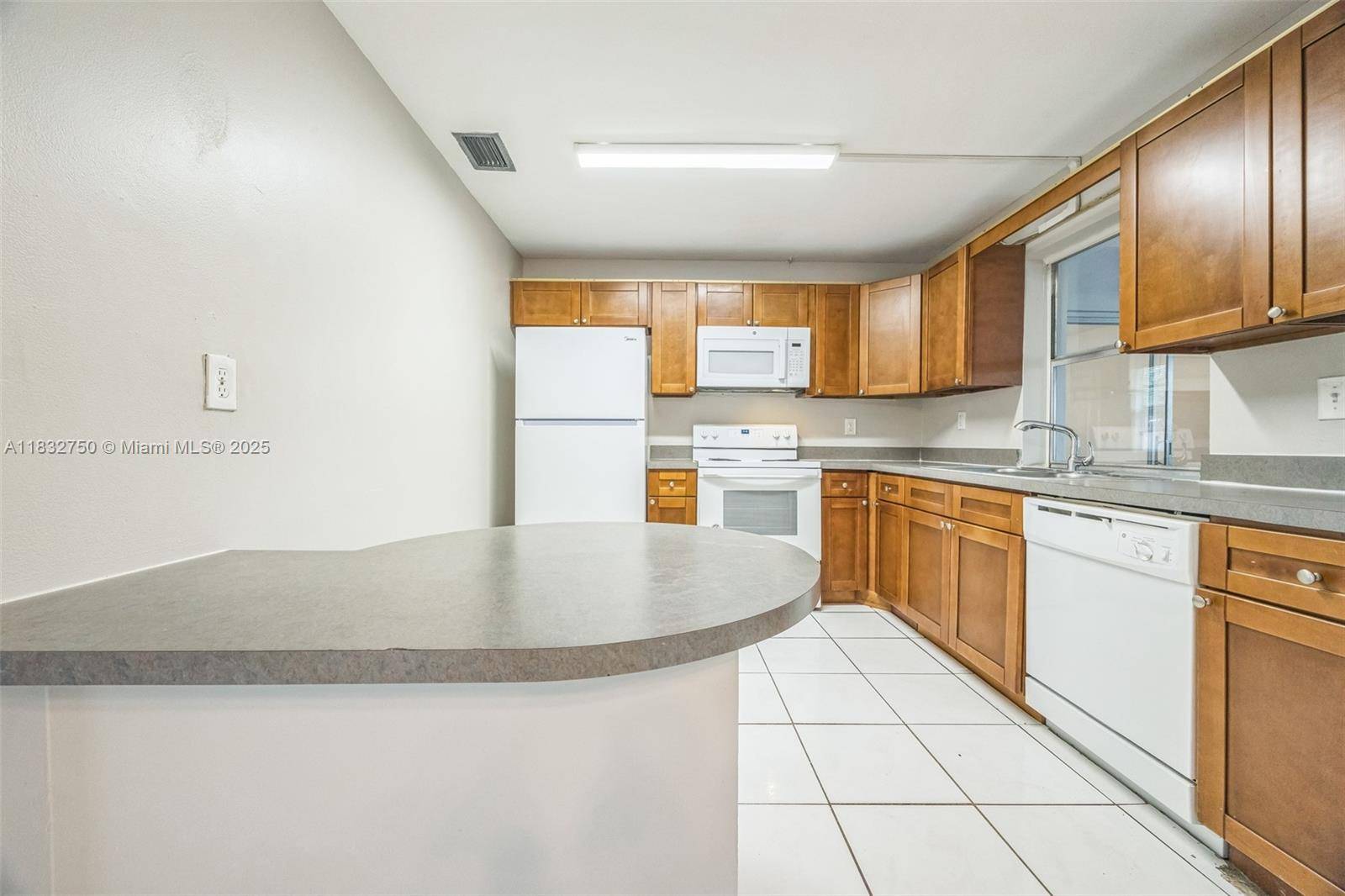Lauderhill, FL 33313,4931 NW 13th St