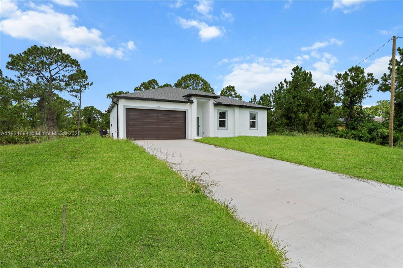 718 Drury Ave, Lehigh Acres, FL 33974