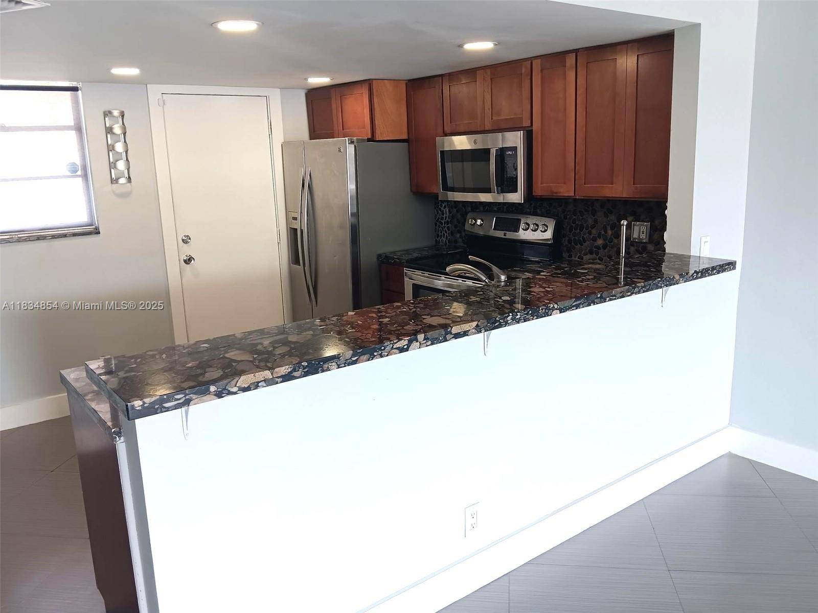 North Miami Beach, FL 33160,3703 NE 166th St #204