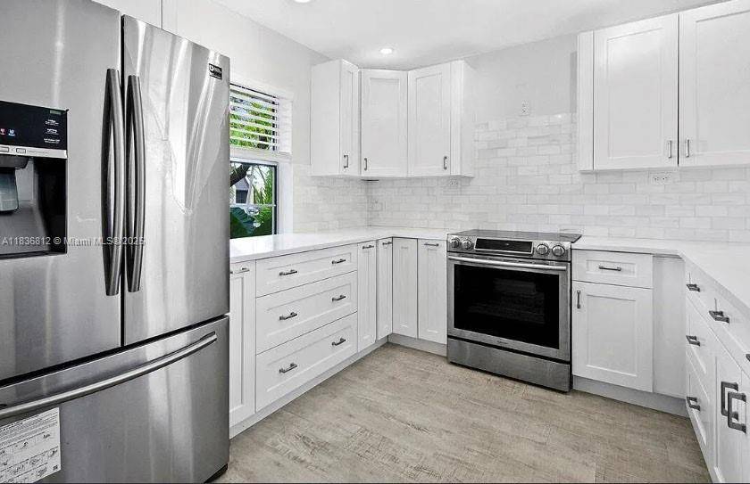 103 Lake Terry Dr, West Palm Beach, FL 33411