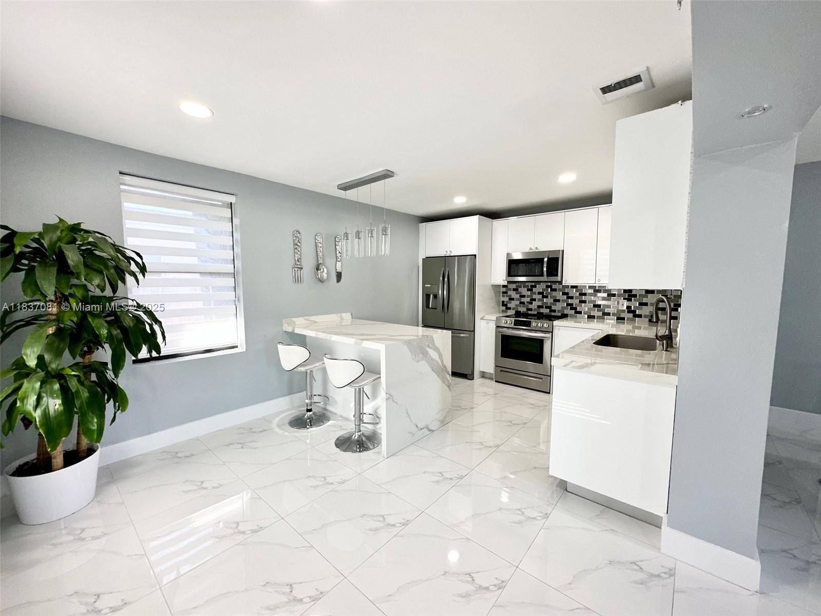 North Miami Beach, FL 33162,460 NE 169th St #1