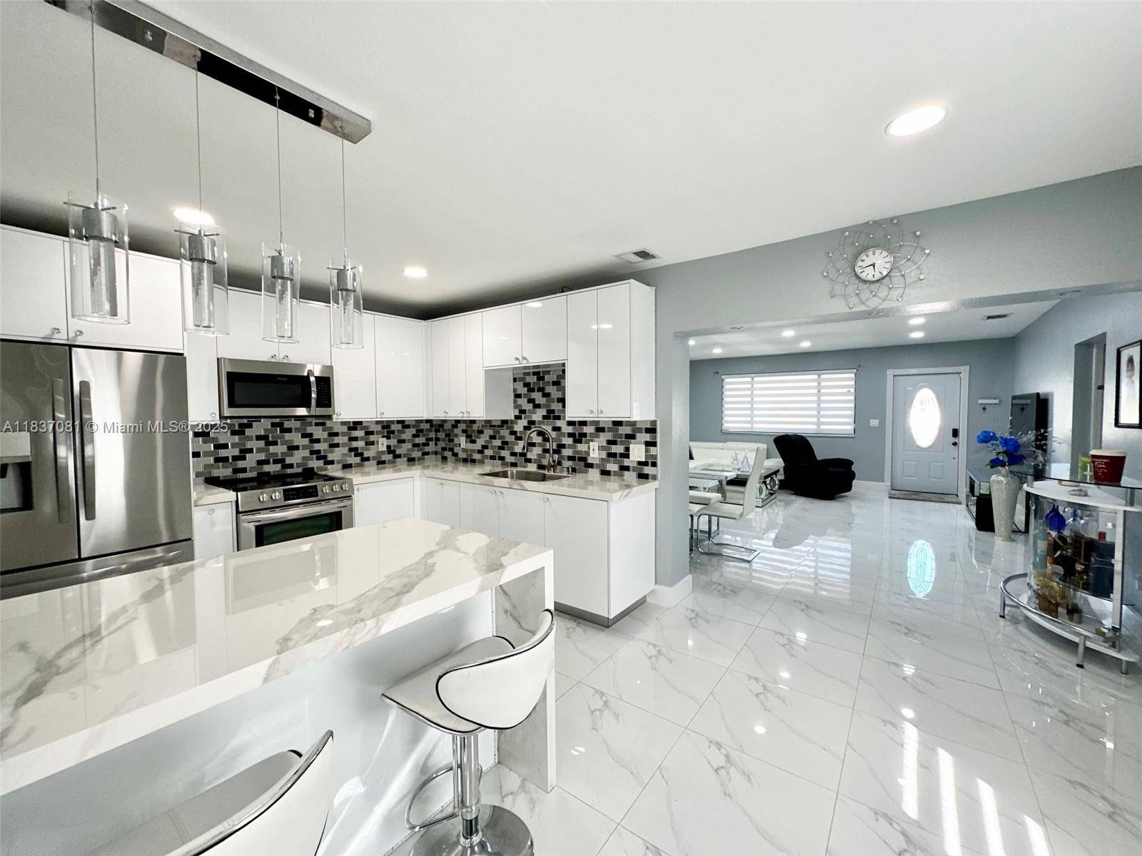 North Miami Beach, FL 33162,460 NE 169th St #1