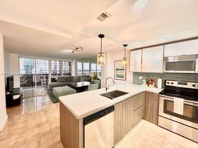 Miami, FL 33137,600 NE 36th St #1220