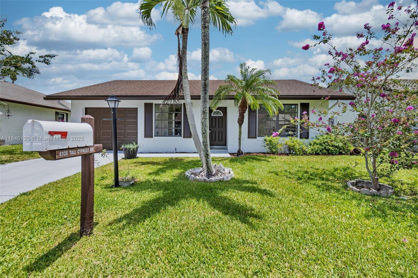 6338 Tall Cypress Cir, Green Acres, FL 33463