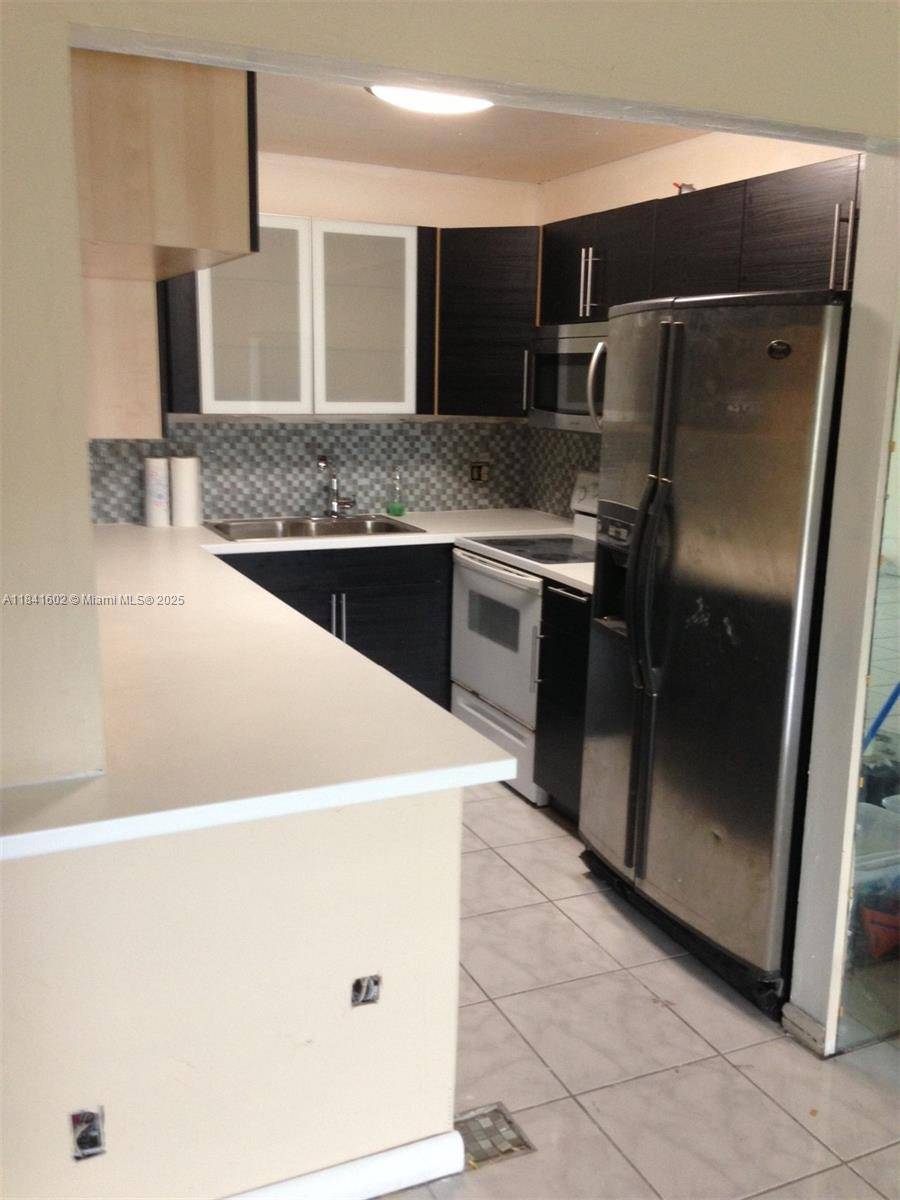 6101 N Falls Cir Dr #409, Lauderhill, FL 33319