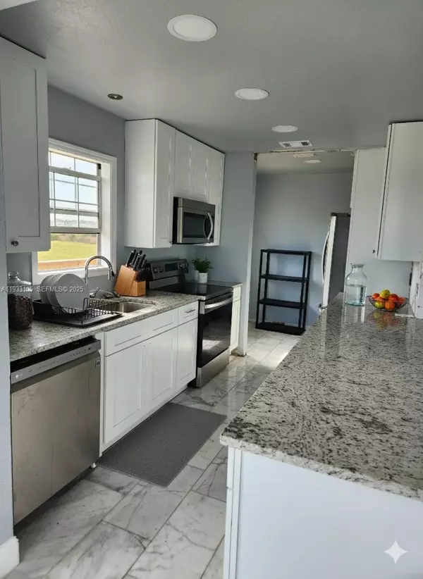 Other City - In The State Of Florida, FL 34972,18820 NW 246TH ST