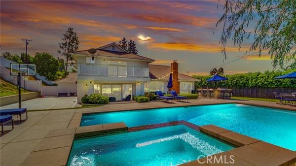 A Timeless Sanctuary: Discover Stately Elegance at 11121 Fenwick Place, Santa Ana