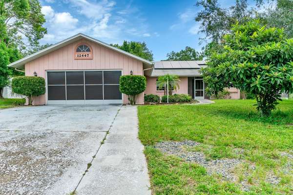 12447 Spreading Oak Drive, Spring Hill, FL 34609