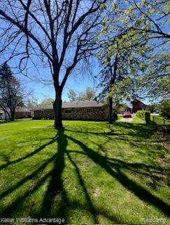 206 N John St, Highland Twp, MI 48357