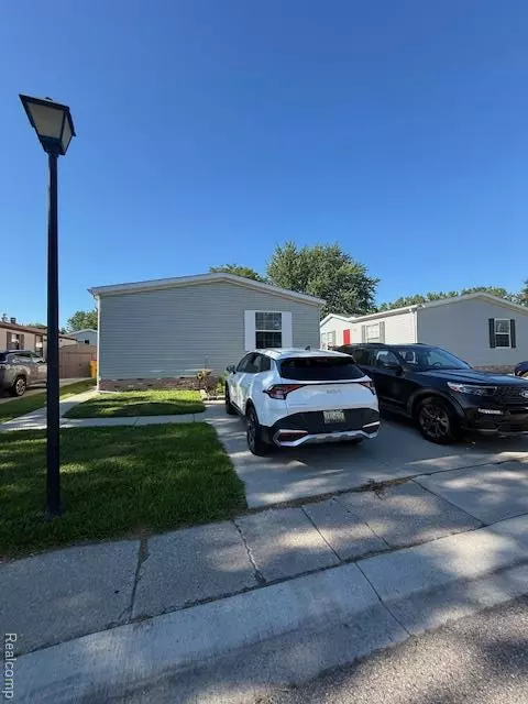 17115 Scarborough Drive, Macomb Twp, MI 48044