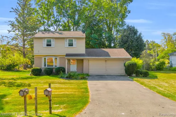 1874 Hopkins Drive,  Wixom,  MI 48393