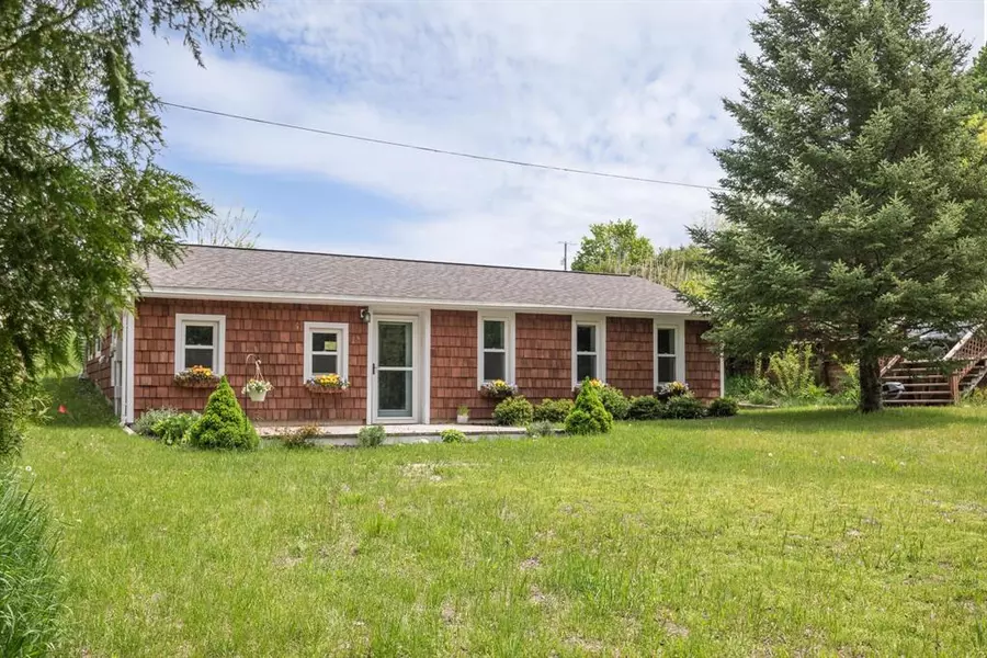 7018 Cedar Run Road, Long Lake Twp, MI 49684