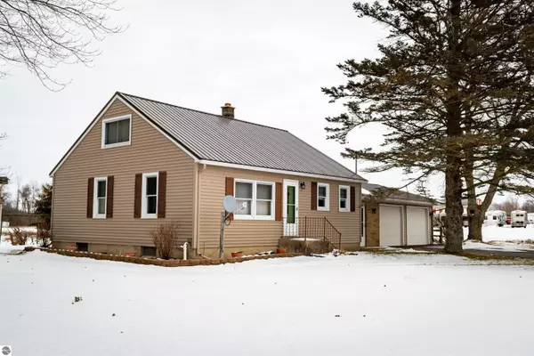 2276 Howard City Edmore Road, Six Lakes, MI 48886