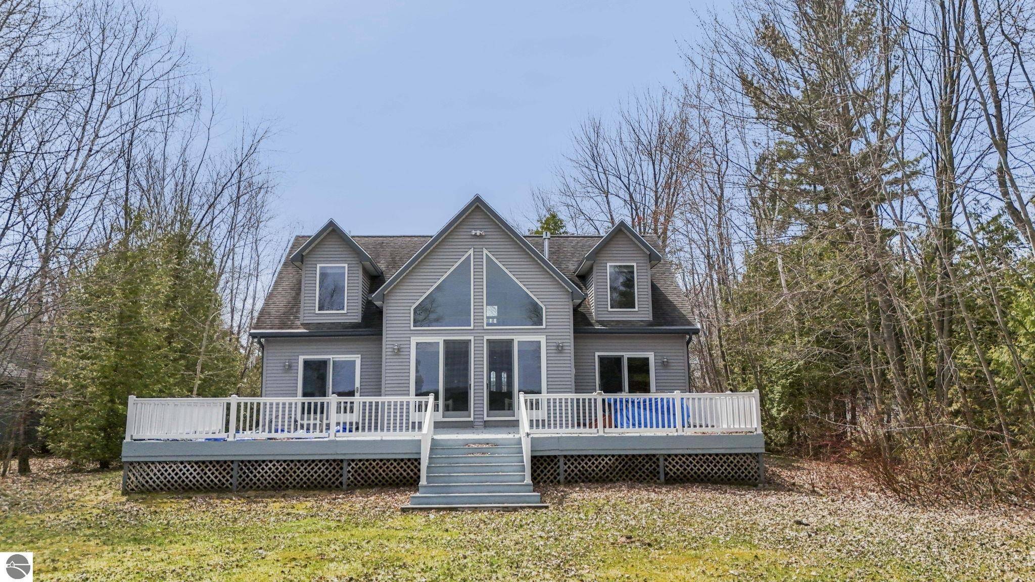 7734 N Shore Court, Grawn, MI 49637