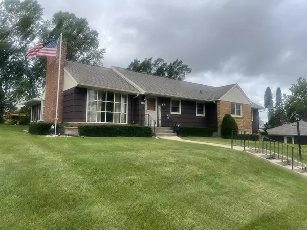 Charming Comfort and Community Await: Discover 90 Saint Joseph St, Markesan, WI