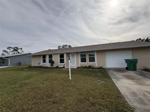 1057 TROPICAL AVE NW, Port Charlotte, FL 33948