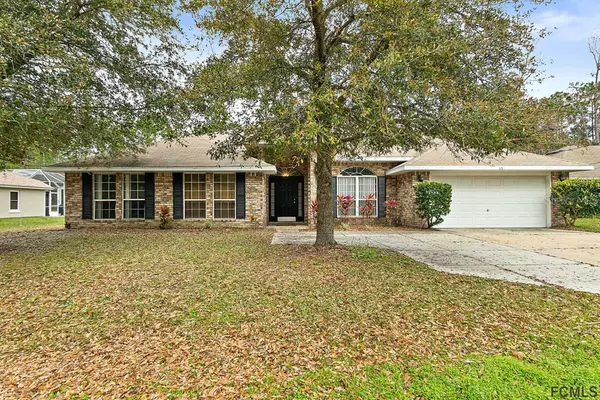 63 WOODSIDE DR, Palm Coast, FL 32164