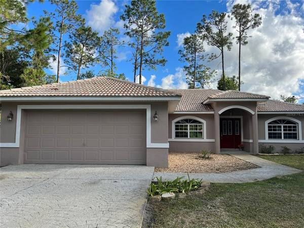 62 BIRD OF PARADISE DR, Palm Coast, FL 32137