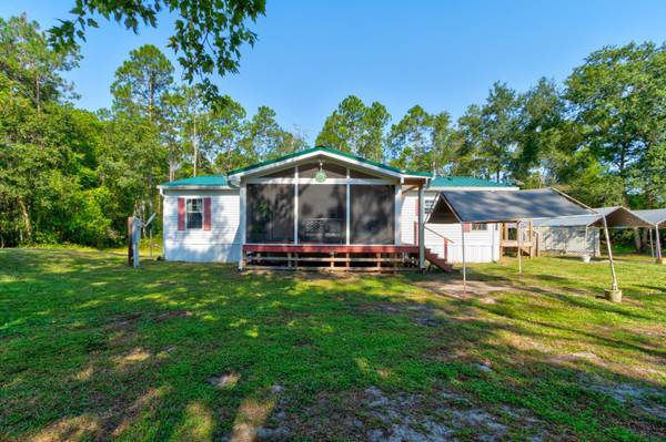 301 DEEP CREEK BRANCH RD, De Leon Springs, FL 32130