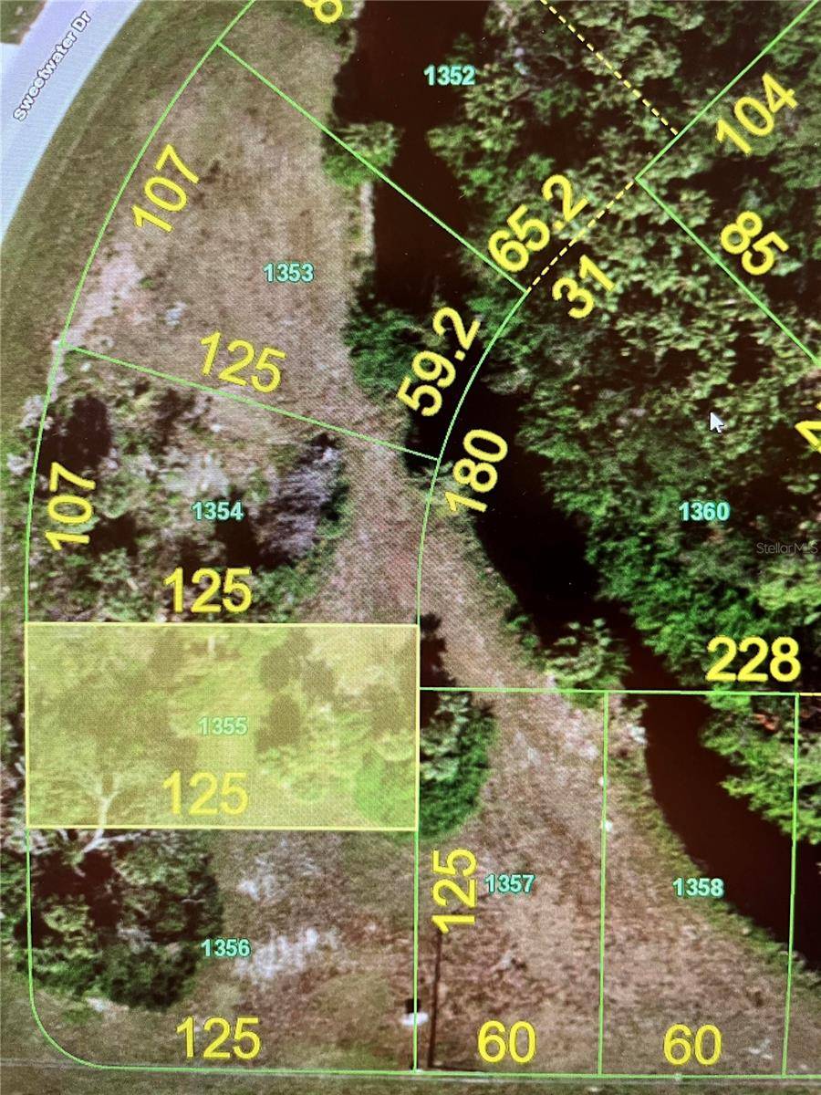 Rotonda West, FL 33947,303 SWEETWATER DR
