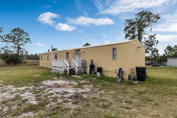 9062 LAKE HATCHINEHA RD, Haines City, FL 33844