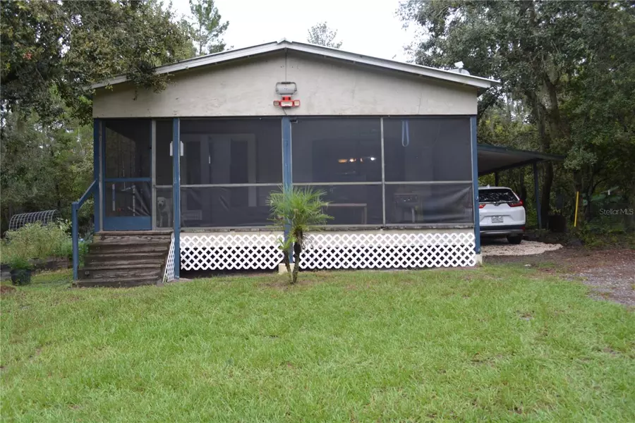 1259 CARUTHERS WOODS RD, Geneva, FL 32732