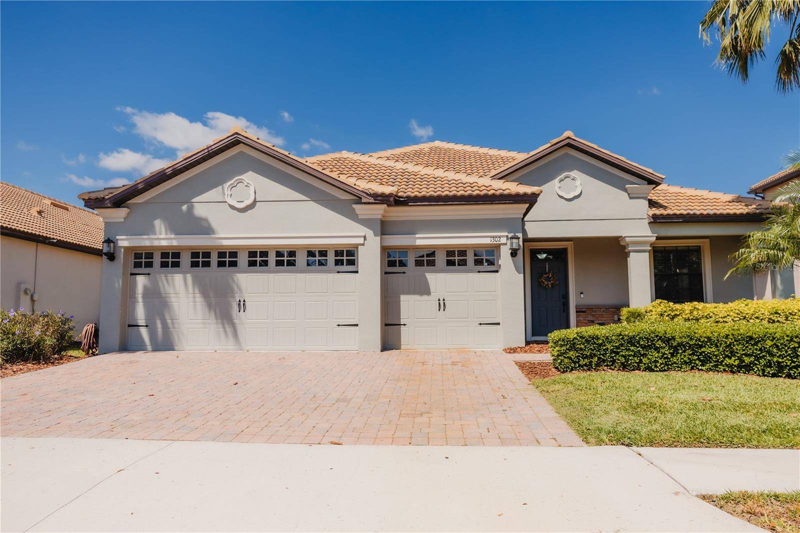 1302 MOSS CREEK LN, Davenport, FL 33896