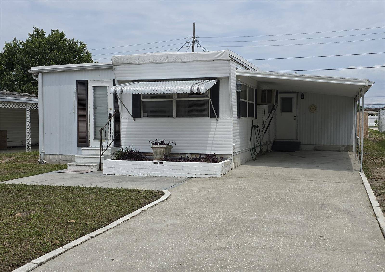 1938 PLEASURE DR, Holiday, FL 34691