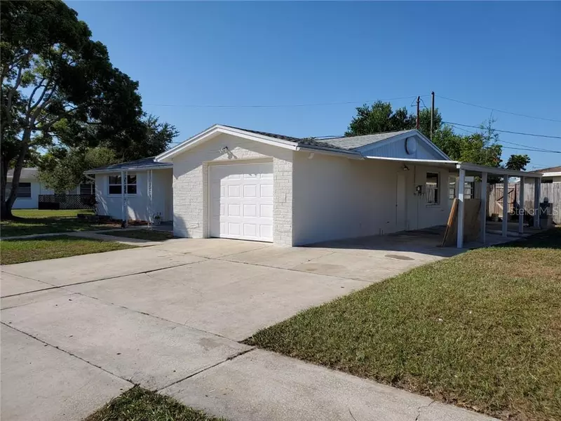 1313 CHANCELLOR DR, Holiday, FL 34690