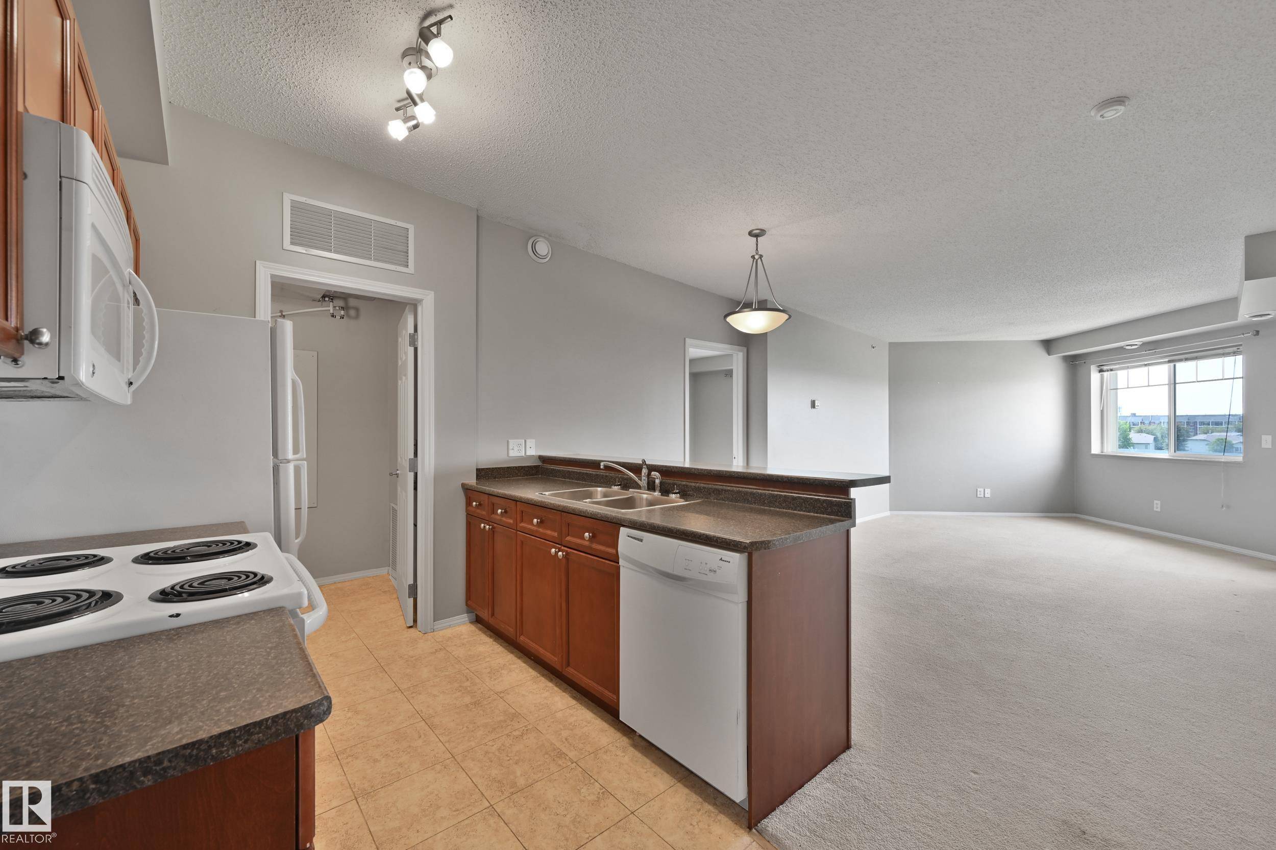 Edmonton, AB T6M 2N8,#409 6921 199 ST NW
