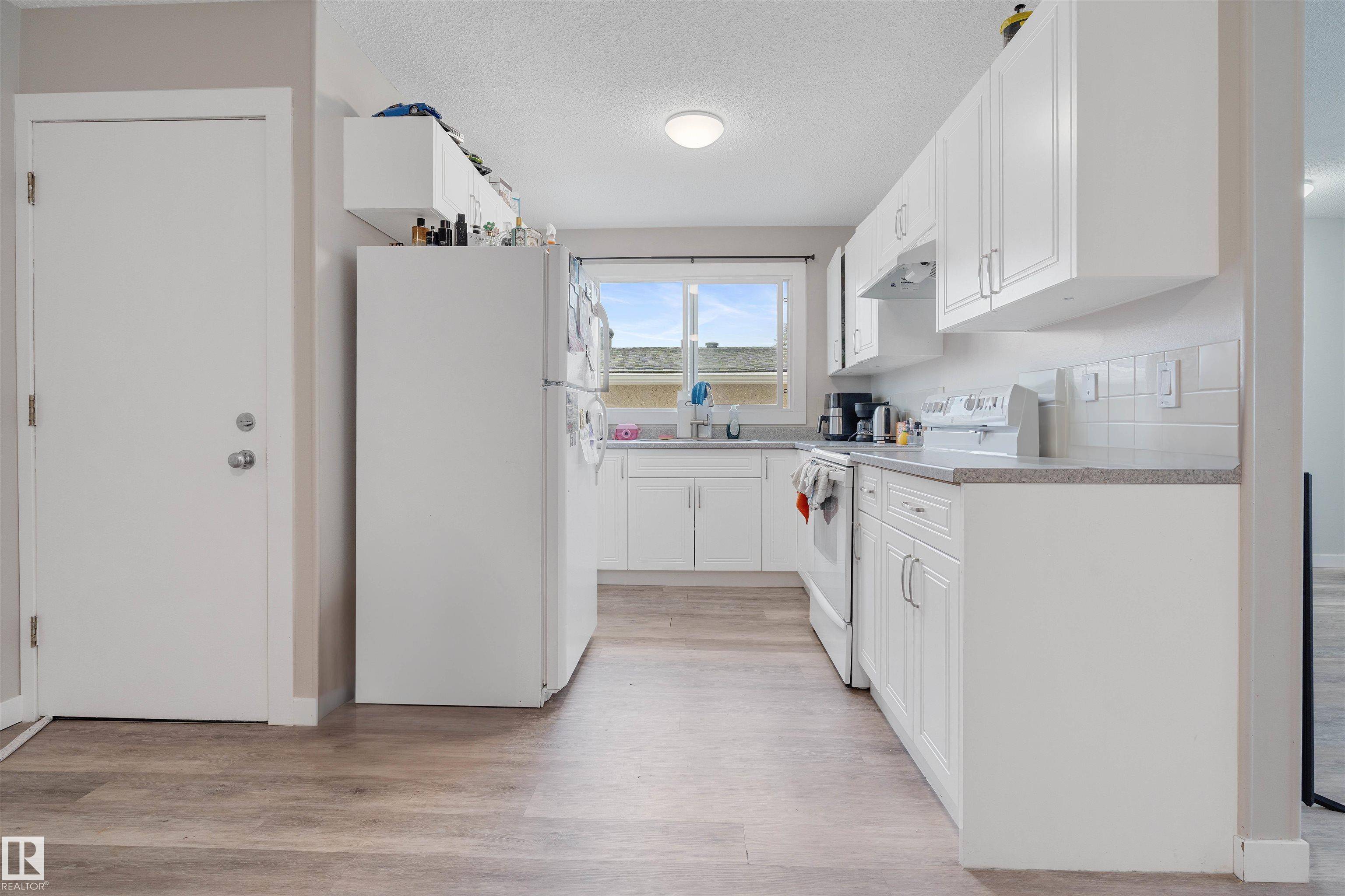 Edmonton, AB T5P 1Z1,10633 152 ST NW