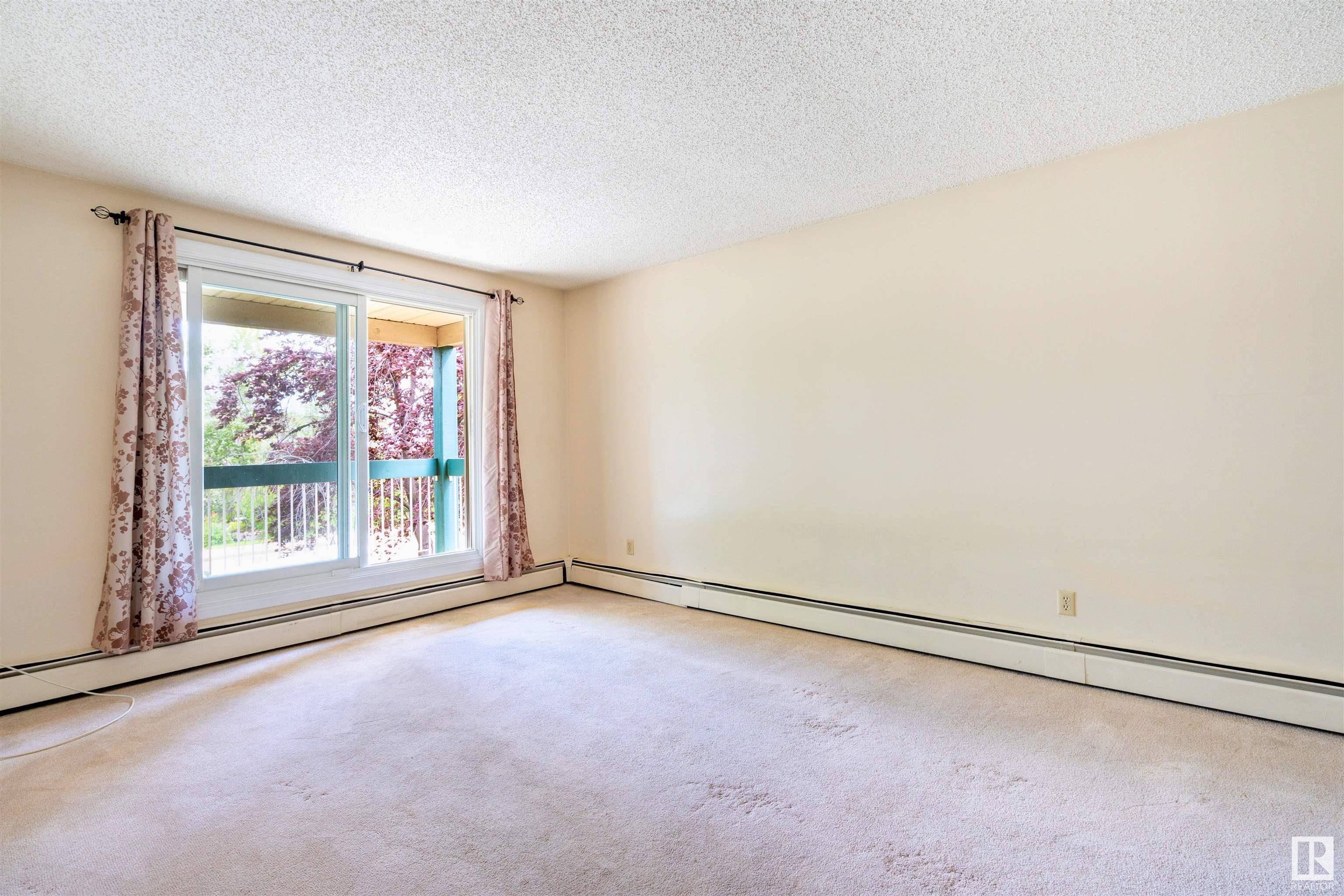 Edmonton, AB T6L 5P2,#203 1628 48 ST NW