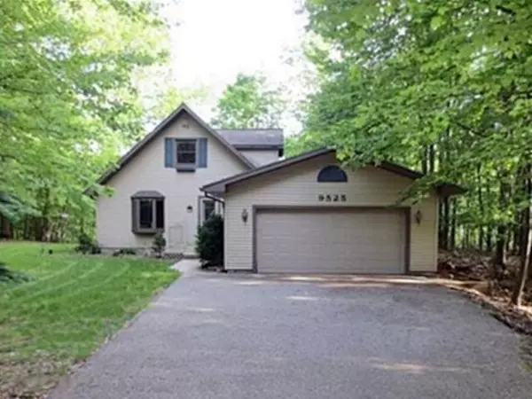 9525 Golf Port Drive, Canadian Lakes, MI 49346