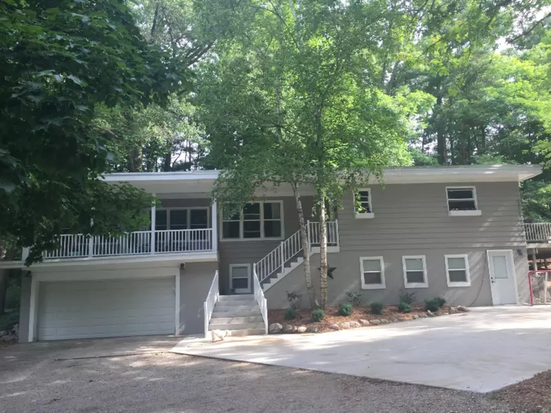 360 Grand River NE Drive, Ada, MI 49301