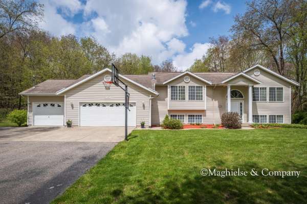 1959 Rogue River NE Road, Belmont, MI 49306