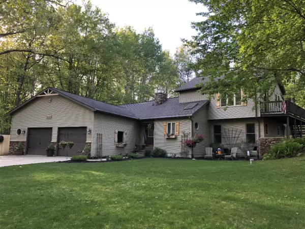 8490 Highland Trail, Canadian Lakes, MI 49346