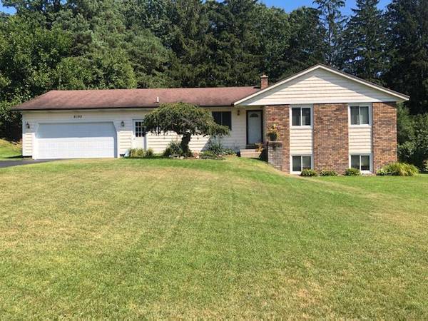 6192 Woodwater NE Drive, Belmont, MI 49306