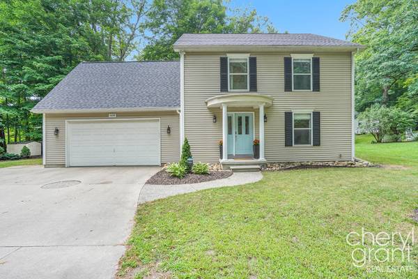 5699 Woodbriar Drive, Belmont, MI 49306